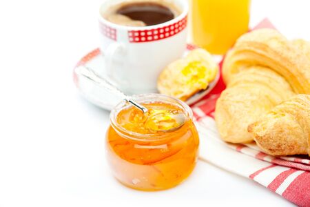 Breakfast setup with croissants and marmaladeの写真素材