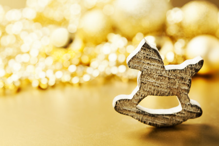 Christmas decoration with wooden rocking horseの写真素材