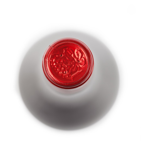 Red wine bottle on white backgroundの写真素材