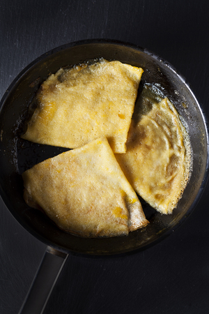 Crepe suzette, traditional french pancakes with orange syrup