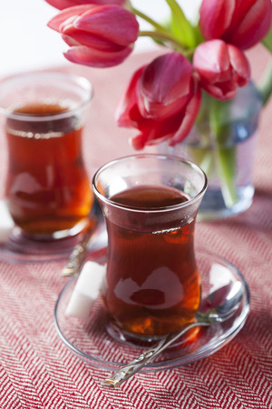 Turkish black tea in traditional tea glassの写真素材