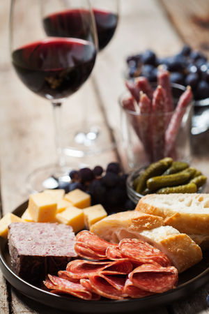 Red wine with charcuterie assortmentの写真素材