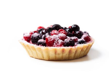 Sweet tartlet with berries on white backgroundの写真素材