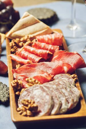 Two glasses of red wine with charcuterie assortment, beaujolais conceptの写真素材