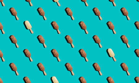 Seamless pattern with ice cream sticks on bright blue backgroundの写真素材
