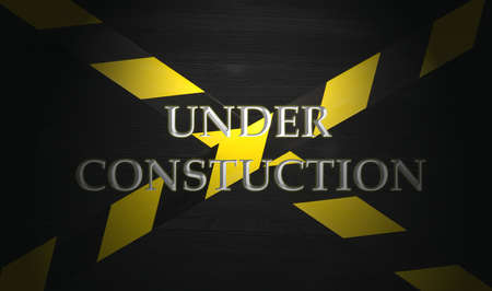 Under construction concept background. Warning tape frame on black wooden surface background with copy space.の写真素材