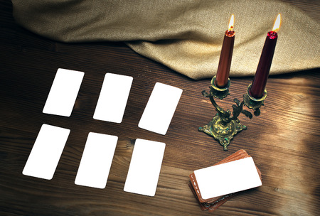 Tarot cards on fortune teller table. Tarot cards mock up.の写真素材