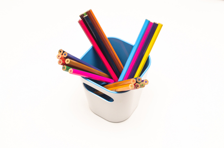 Color pencils in pencil holder isolated on white background.の写真素材