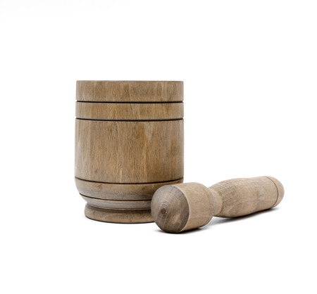Wooden mortar with pestle isolated on white background. Kitchenware.の写真素材