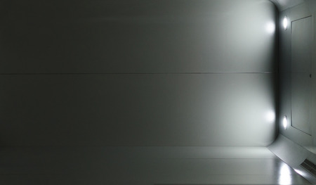 Horizontal shot of lift cabin which like on a space gateway.