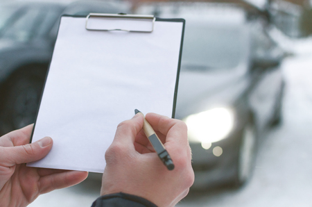 Invoice for payment for car repair concept or car insurance document mockup. Act of receiving the transfer of the vehicle. Car fix list.の写真素材