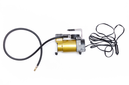 Car pump auto air compressor isolated on the white background.の写真素材