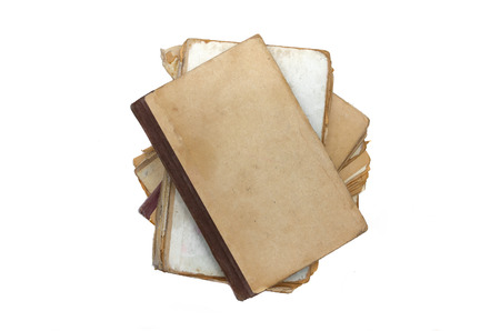 Stack of aged books isolated on a white background.の写真素材