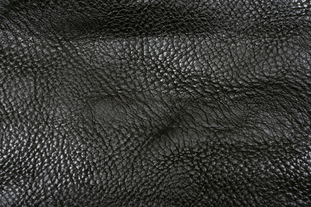 Black leather texture background.