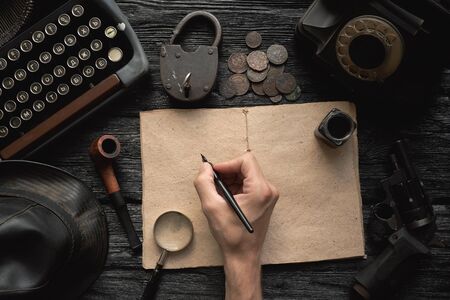 Retro detective book template with blank pages for copy space. Detective or spy agent story flat lay...