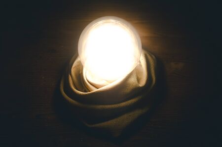 Crystal ball on fortune teller desk table background. Seance concept. Future reading.