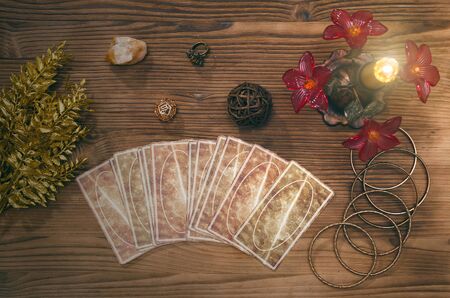 Tarot cards on fortune teller desk table background. Futune reading concept. Divination.の写真素材