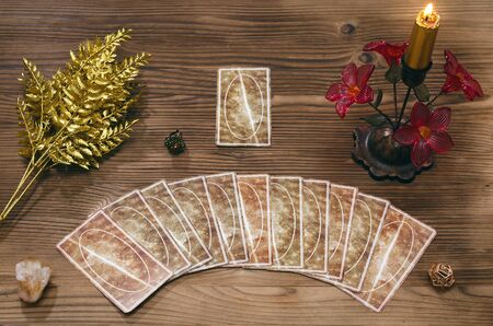 Tarot cards on fortune teller desk table background. Futune reading concept. Divination.