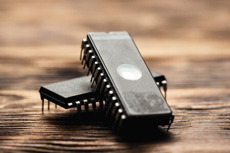 Old microcircuit on a table close up.の写真素材