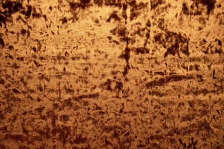 Golden velvet cloth texture background. Top view.の写真素材