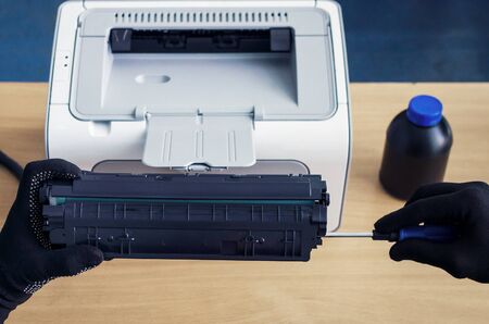 Laser cartridge toner refill concept. Office equipment maintenance concept.の写真素材