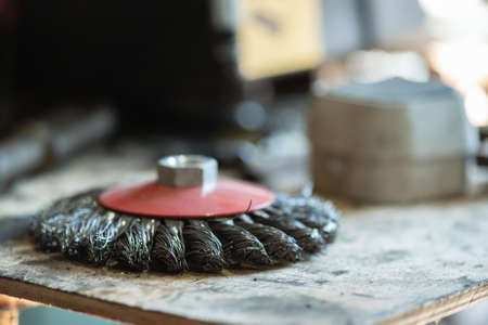 Grinding disc for metal on the workbench close up background.の写真素材