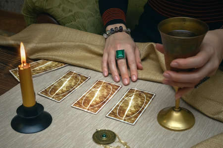Tarot cards and fortune teller desk table. Future reading.の写真素材
