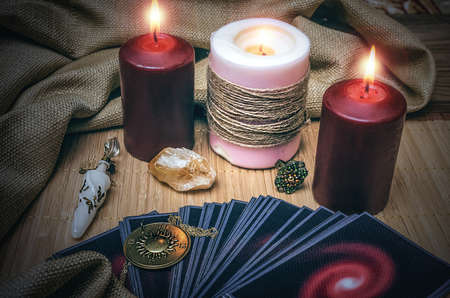 Tarot cards on desk table of fortune teller. Future reading concept.