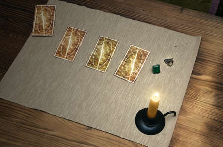 Tarot cards on fortune teller desk table. Future reading.
