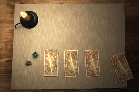 Tarot cards on fortune teller desk table. Future reading.