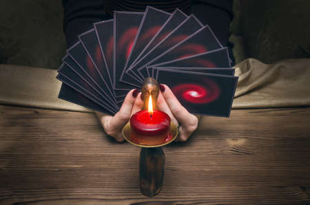 Tarot cards on wooden table. Fortune teller.の写真素材