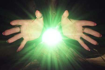 Crystal ball and fortune teller hands. Divination. Seance.の写真素材