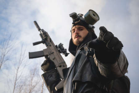 Post apocalypse soldier with a rifle concept.の写真素材