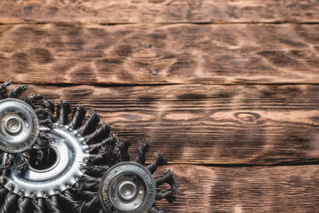 Grinding discs on the wooden workbench background.の写真素材