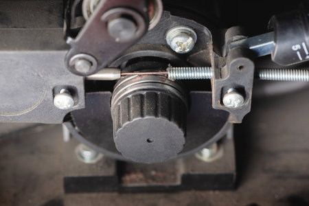 Pressure roller of the semi automatic welding machine close up.