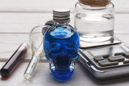 Posion liquid in the bottle concept background. Danger water.