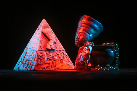 Bust of Nefertiti on the table on the dark background.Ancient Egypt concept background.の写真素材
