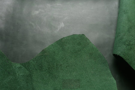 Green leather surface texture background. Top view. Flat lay.の写真素材