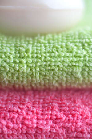 Two towels and soap closeup shotの写真素材