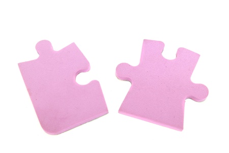 Two puzzles isolated on white backgroundの写真素材