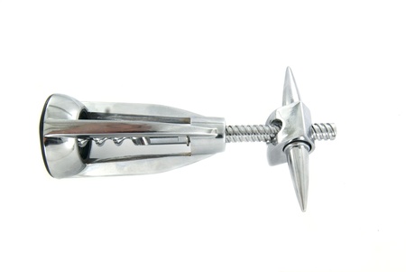 Metal corkscrew isolated on white backgroundの写真素材