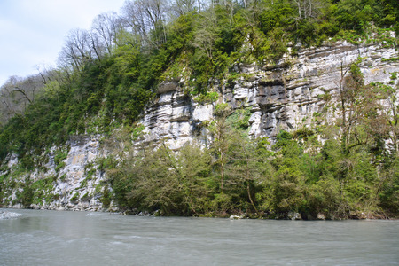 Bank of Mzymta river on the Caucasus with the abrupt slopeの写真素材