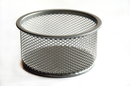 Metallic empty office box on white with mesh ornamentの写真素材