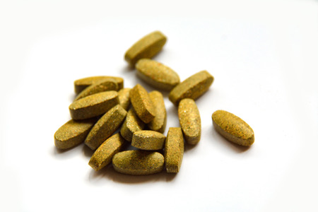 Oval pills on white backgroundの写真素材