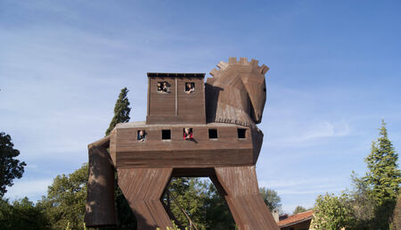The wooden statue of the trojan horse with people indoorsのeditorial素材