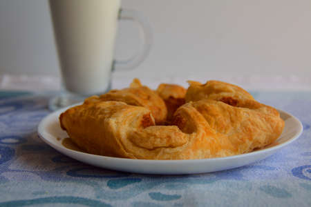 Cheese puff pastry on the plate with a shakeの写真素材