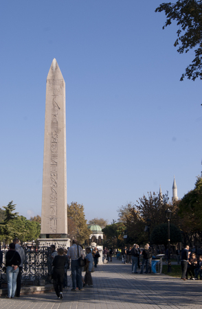 Walled obelisk (Constantine obelisk) at the Hippodrome, Istanbul, Turkey, with people watchingのeditorial素材