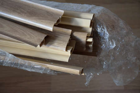 Baseboard in wrap on the floorの写真素材