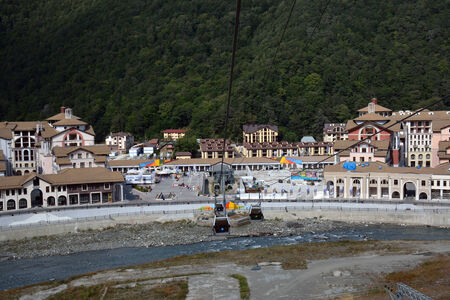 Buildings in the embankment of Mzymta river, Sochi, Russia, with the cabins belowのeditorial素材