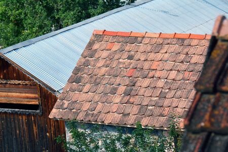 roof of the house with old tiles in a villageの写真素材